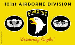 Yellow graphic featuring the 101st Airborne Division insignia, including the central black shield with a white eagle head and the words AIRBORNE, flanked by two circular black emblems with white wings. Large black text at the top reads 101st AIRBORNE DIVISION, with red script text near the bottom reading Screaming Eagles. USPatriotFlags.com on the left edge.