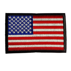 Embroidered patch of the American flag on a white background