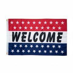 Welcome Slogan Flag 3x5 Economical B2G1 layflat on a white background with natural nylon folds, white hoist hem, and two gold grommets on the left edge
