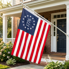BR76 Betsy Ross 1776 flag flying outside an American home