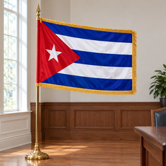 Fringed Cuba flag displayed indoors