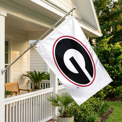 Georgia Bulldogs white-background flag flying from a coastal Florida porch