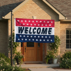 Welcome Slogan Flag 3x5 Economical B2G1 mounted from the left hoist edge with grommets along the left side beside a welcoming entrance