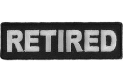 A rectangular black embroidered patch with the word 'RETIRED' in bold white capital letters, shown on a plain white background.