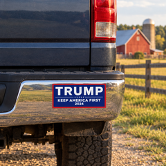Trump Keep America First bumper sticker on a pickup truck at a farm